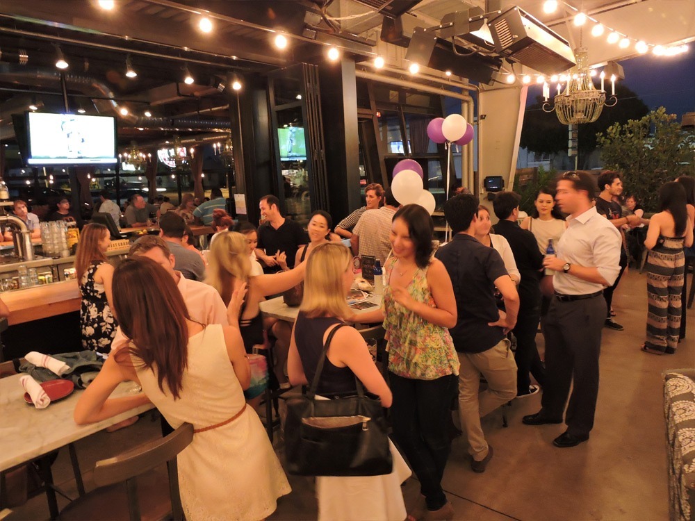 Ballet Arizona Young Professionals Event - Participants enjoying a ballet-themed social occasion with enthusiasm